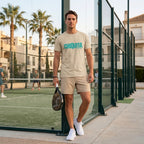Man wearing desert dust CHIQUITA organic cotton padel lifestyle t-shirt - LobStory