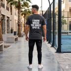 Back view of a model wearing a premium organic cotton padel lifestyle tee with bold branding by LobStory. "I KNOW WHERE THE SWEET SPOT IS" 