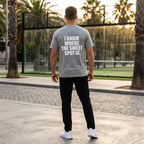 Back view of a model wearing a premium organic cotton padel lifestyle tee with bold branding by LobStory. "I KNOW WHERE THE SWEET SPOT IS" 