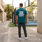 Back view of a model wearing a premium organic cotton padel lifestyle tee with bold branding by LobStory. "I KNOW WHERE THE SWEET SPOT IS" 