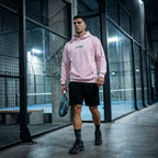 Front view of a model wearing a premium heavyweight padel lifestyle hoodie for maximum comfort.