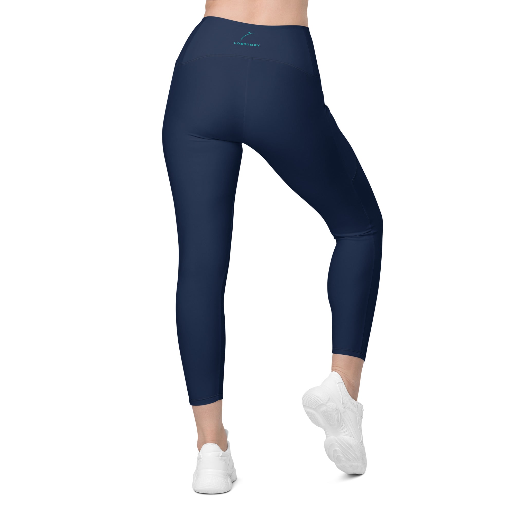 Side and back view of a model wearing navy performance leggings, showcasing the flattering high-waisted fit. lobstory