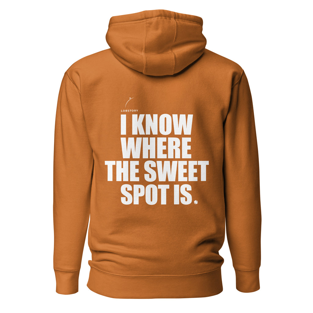 Back view mockup of a premium padel hoodie with bold I Know Where The Sweet Spot Is statement. Lobstory.eu
