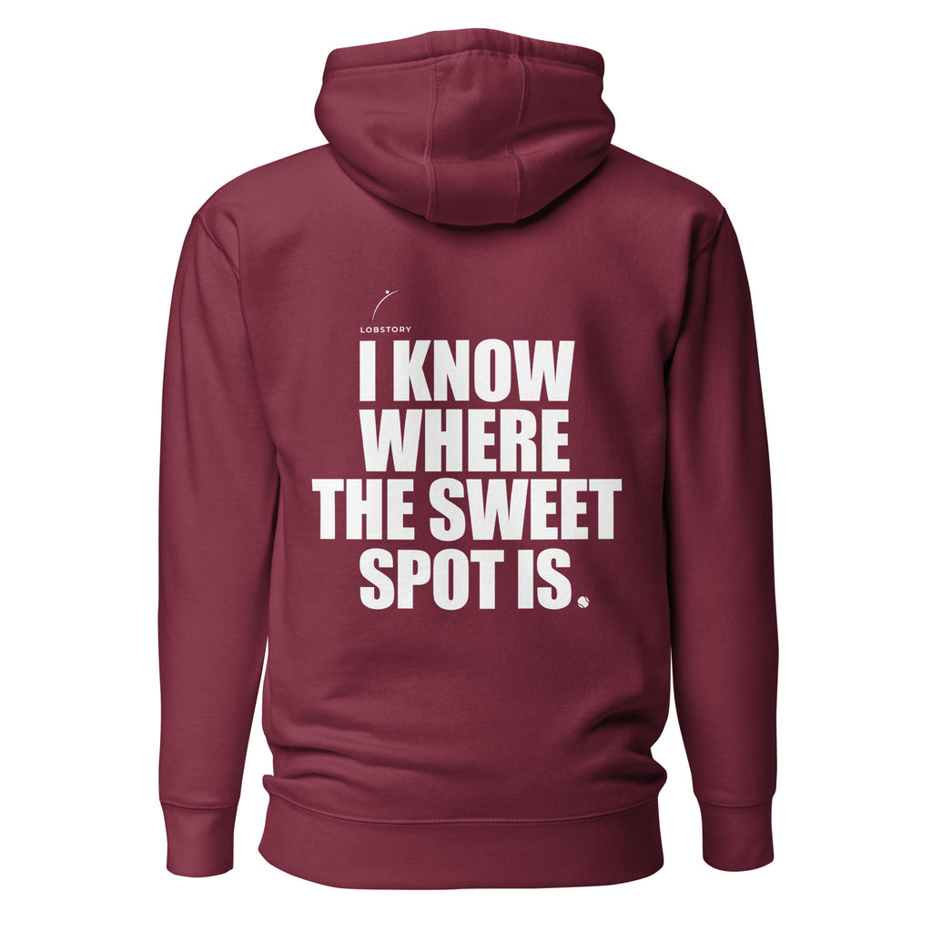 Back view mockup of a premium padel hoodie with bold I Know Where The Sweet Spot Is statement. Lobstory.eu